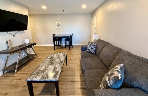 South Central Omaha Apartment | King Bed Oasis, Steps from UNO Bliss
