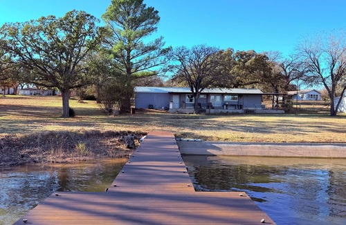 Nocona House | Lakefront 3BR/2BATH with Private Dock on 3/4 Acre in terrific Nocona with AC