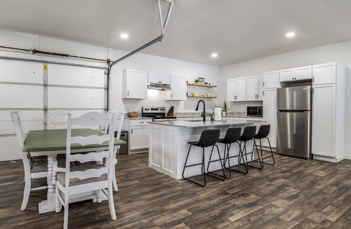Garfield House | LAKEFRONT Bliss FLAT to water: Spacious home with Game Room, Sleeps 15 Guests!