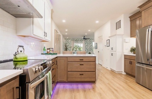Mid America House | Lakefront Condo with Pool, Fire Pit, and Boat Slip