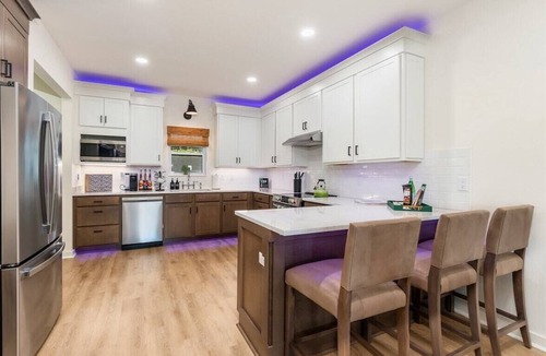 Mid America House | Lakefront Condo with Pool, Fire Pit, and Boat Slip