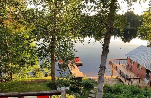 Ahmic Harbour Cottage | Lakefront cottage getaway. Dock by day, fire by night!