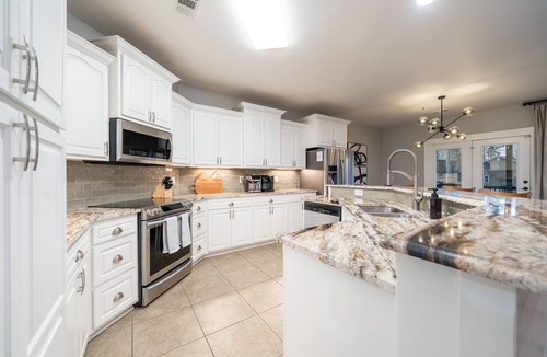 Mid America House | Lakefront Lux: Pool, Hot Tub, Game Room, Fire Pit