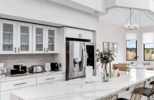 Rowlett Villa | Lakefront Luxe 6BR/4.5B Home with Pool & Hot Tub