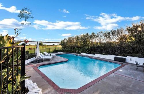 Rowlett Villa | Lakefront Luxe 6BR 4B Home with Pool & Hot Tub