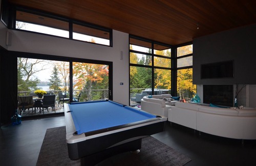 Dysart et al Cottage | Lakefront Luxury-Glass cottage, level lot, large dock, hot tub, private!