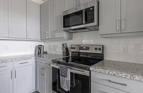 Spring Branch East Apartment | Landing | Chic 2BD, Courtyard, Gym