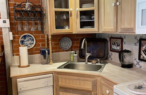 Monroe House | Layton Castle's Carriage House - 2bdrm/2bath with a sunroom and high ceilings.