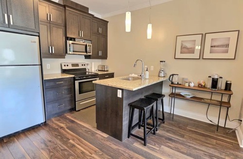 Bromont Condo | LE CHAMPLAIN CONDO 104, in BROMONT, View on the Pool and Mountain, CITQ#248205