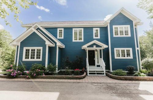 Humber Valley Ski Chalet | Luxurious Lakeside Chalet with Swim Spa
