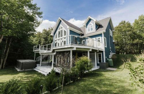 Humber Valley Ski Chalet | Luxurious Lakeside Chalet with Swim Spa