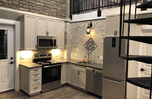 Inner Harbour Apartment | Luxury, top floor suite with free parking space. Walking distance to downtown!