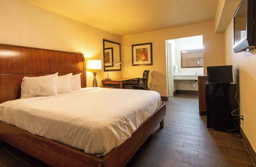 Irving Hotel | Magnuson Extended Stay and Suites Airport Hotel