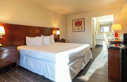 Irving Hotel | Magnuson Extended Stay and Suites Airport Hotel