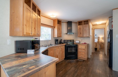 Royal House | Mobile Home E-1 at Safe Harbor Brady Mountain on Lake Ouachita!