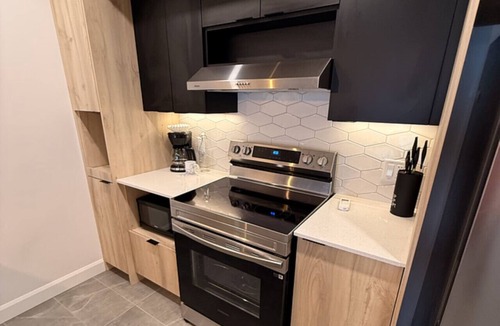 Plateau Apartment | Modern 1BD Suite at Le Prisme w/Indoor Pool, Gym & Yoga Studio