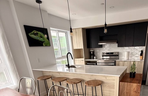 Plateau Apartment | Modern 1BD Suite at Le Prisme w/Private Balcony, Pool, Gym & Yoga Studio
