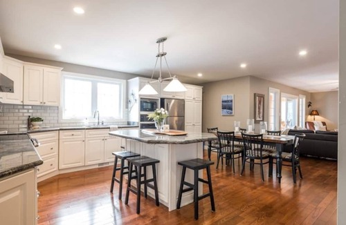 Perry House | Modern 4BR Lakefront Cottage w/Hot Tub & Dock