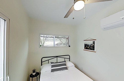 Spicewood House | Modern Container Home with Wraparound Deck & Covered BBQ Area