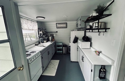 Machin Cabin | Modern Tiny Cottage on Eagle Lake with South facing Private Beach