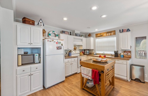 Carolyn Estates House | Open Water~Sunsets~Swimming~Standing Work Station with High Speed Internet~Lake