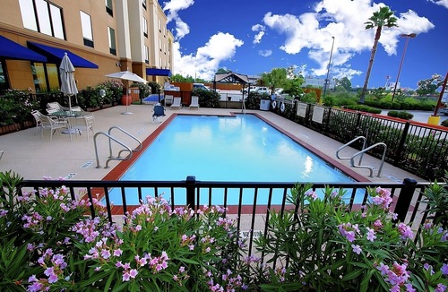 Tomball Hotel | Relax and Unwind! Outdoor Pool, Parking Onsite, Free Breakfast!