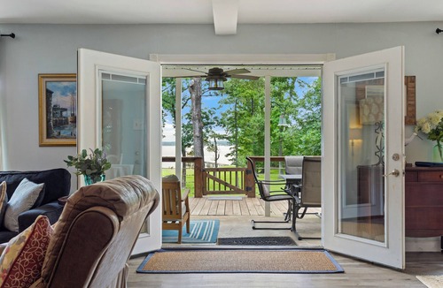 Chandler House | Relaxing Lakefront Home w/Boat Dock, Fire-pit and private Walk-in Beach! Gated