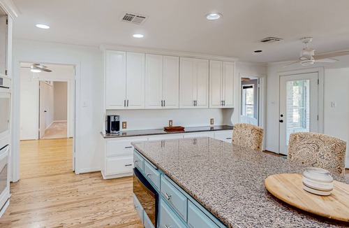 China Spring House | Remodeled riverfront home & guest house with firepit, grill, river views, patio