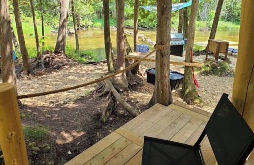 Chatsworth Cabin | Riverside Retreat waterfront Luxury Glamping King size bed and very private