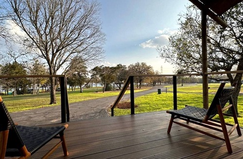 Bastrop Cabin | Romantic Lakefront Cabin with Fire Pit near Lake Bastrop, Texas – Luxury Glamping Escape for Couples