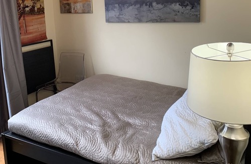 Regal Heights House | Room with double bed and private balcony.