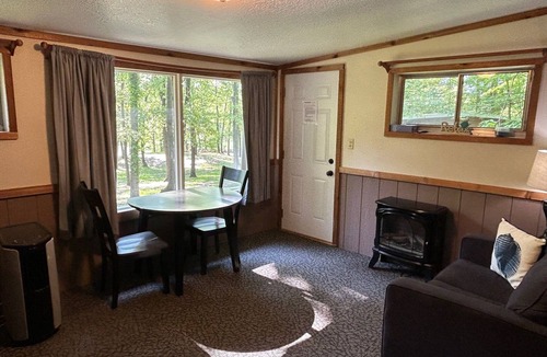 Palmyra Cabin | Rustic cabins in secluded campground with lake access and woods to wander in.