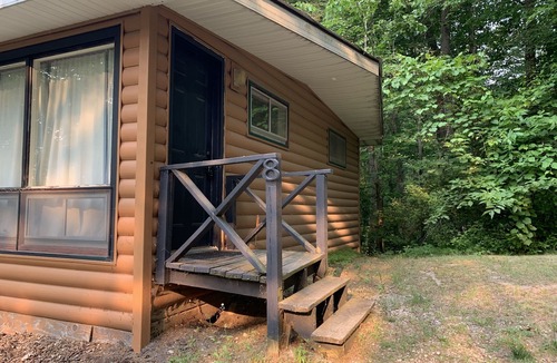 Sand Creek Cabin | Rustic cabins in secluded campground with lake access and woods to wander in.