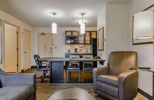 Central Oklahoma City Hotel | Rustic Elegance in the Heartland! 2 Modern Units, Full Kitchen, Pets Allowed!