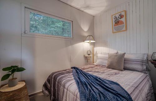 Lake St. Peter House | Rustic Waterfront Cabin with BBQ, Fire Pit and Views