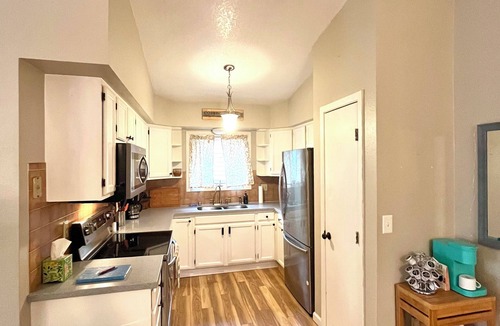 Eagle River House | Scenic, cheery, and bright Eagle River home base to adventure.