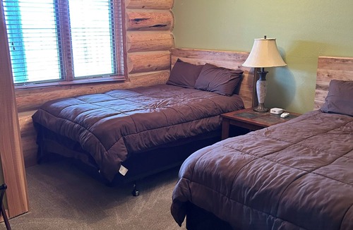 Cheyenne County Cabin | Secluded & Spacious Log Cabin Lodge Located in Western Nebraska - Pet-friendly!