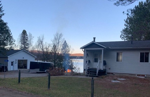 Notre-Dame-de-Pontmain Cottage | Serene waterfront 4 bdrm/2 bath cottage with wifi/hot tub/deck/bbq/firepit/dock