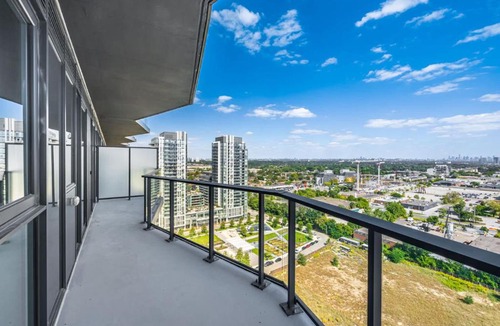 The Queensway Apartment | Sleek 2BR Condo with Balcony & Skyline Views