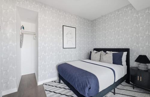 Islington - City Centre West Apartment | Sleek 2BR Condo with Private Patio & Parking