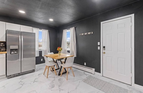 University Area House | "Sleek and Modern UMED Retreat: Black and White Beauty"