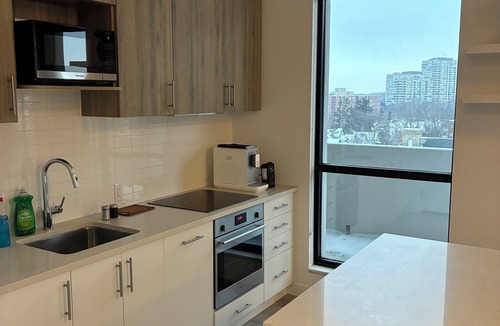 Waterloo Apartment | Spacious 2BR + Sofa Bed | Walk to Laurier & Uptown | Free Parking