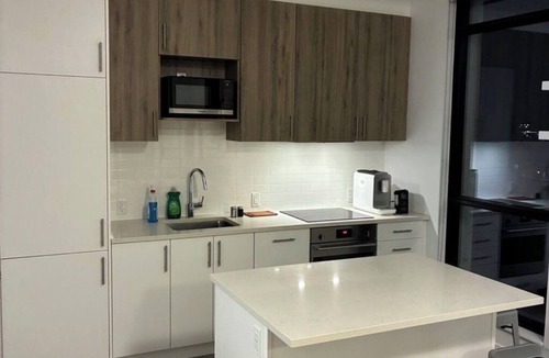 Waterloo Apartment | Spacious 2BR + Sofa Bed | Walk to Laurier & Uptown | Free Parking