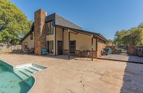 South Oklahoma City House | Spacious 4-bedroom House with a Pool, Hot Tub and a Large Backyard