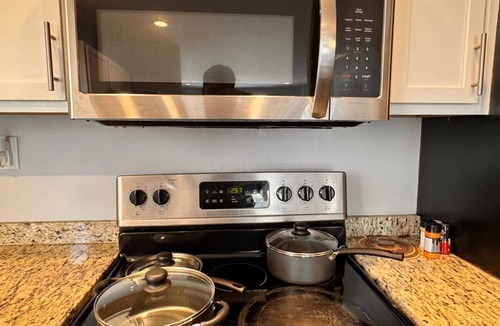 East Windsor House | Spacious Home with King Beds, Backyard Patio & BBQ