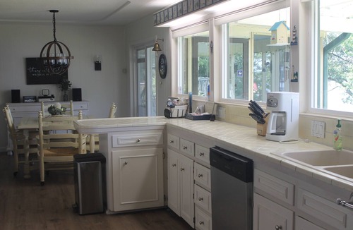 Chandler House | Spacious lakefront home with private dock and 2 living areas.