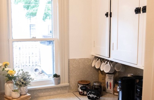 East Avenue House | Spacious Park Ave Retreat with a Hot Tub and AC!