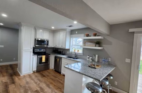 Denison House | Spacious Remodeled Home with Huge Backyard