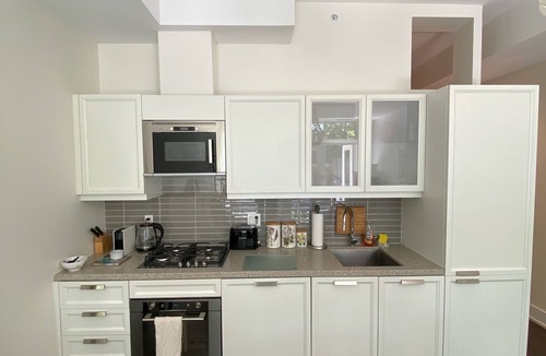 The Beaches Apartment | Steps from the Beach! Beautiful 1 Bedroom Condo w/Spacious Patio