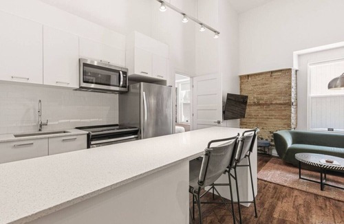 Chinatown Apartment | Stone Loft 2BR Downtown Montreal